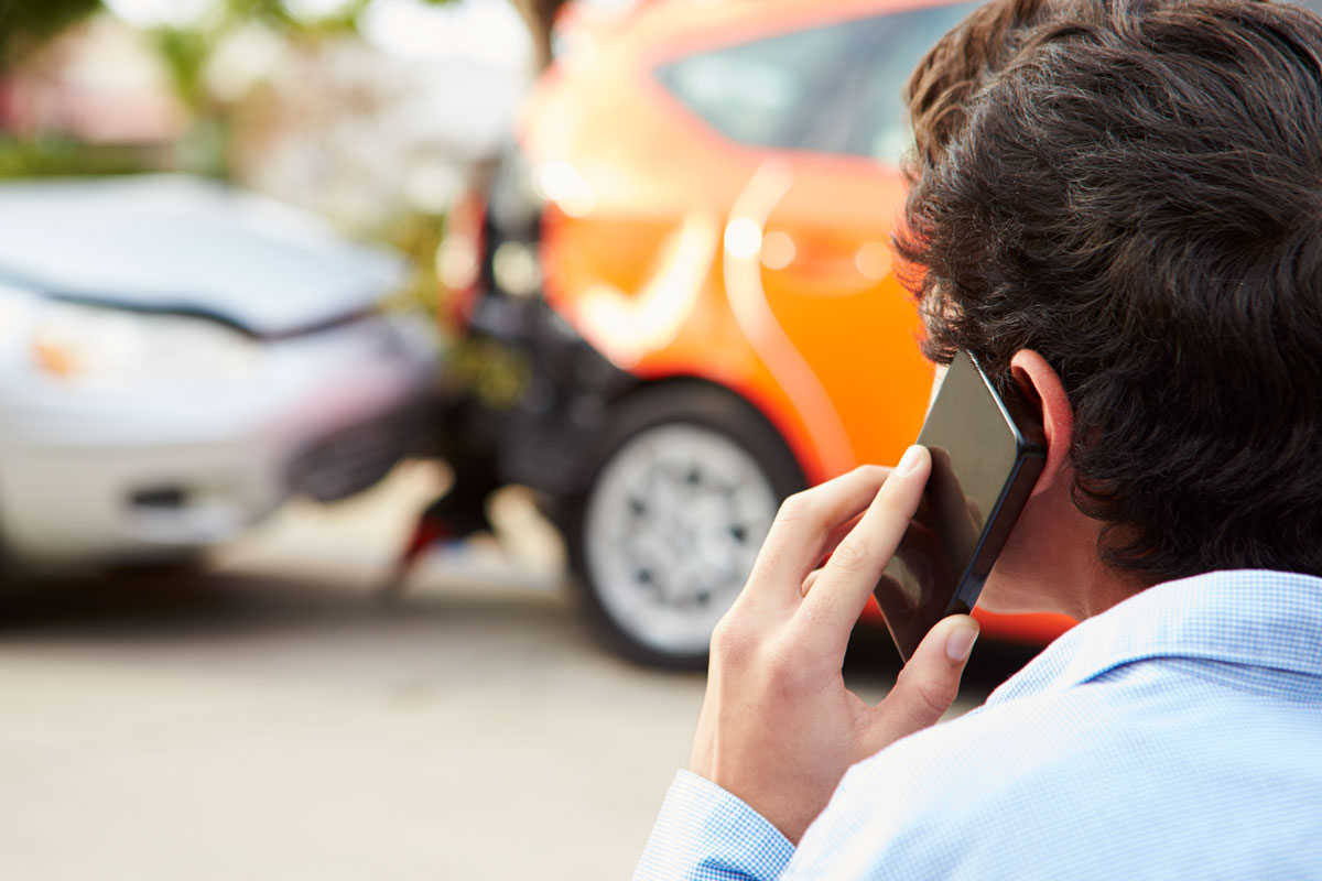 Person calling in car accident to insurance company in Tampa, FL